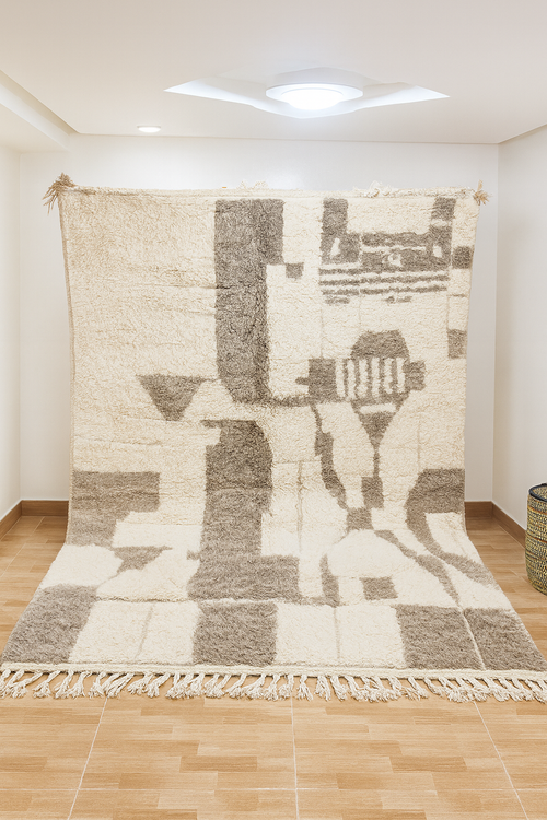 tapis berbere beige motifs abstraits