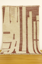 Tapis berbère en laine à motifs bruns géométriques