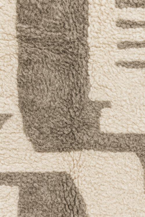 tapis berbere beige motifs abstraits